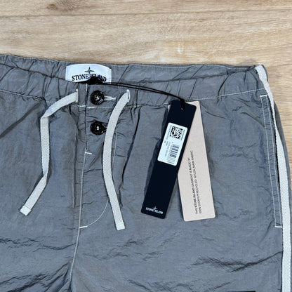 Stone Island Nylon Metal Button Swim Shorts in Pearl Grey