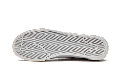 Blazer Low "Sacai - White Patent Leather" DM6443 100