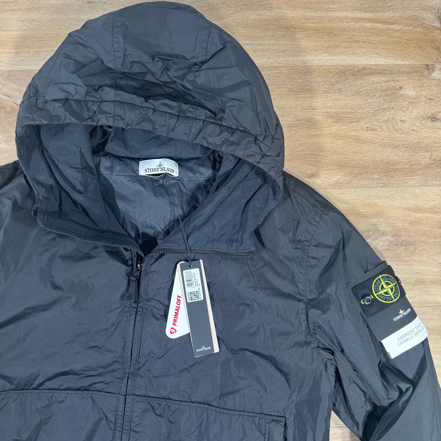 Stone Island Crinkle Reps NY Padded Jacket in Black