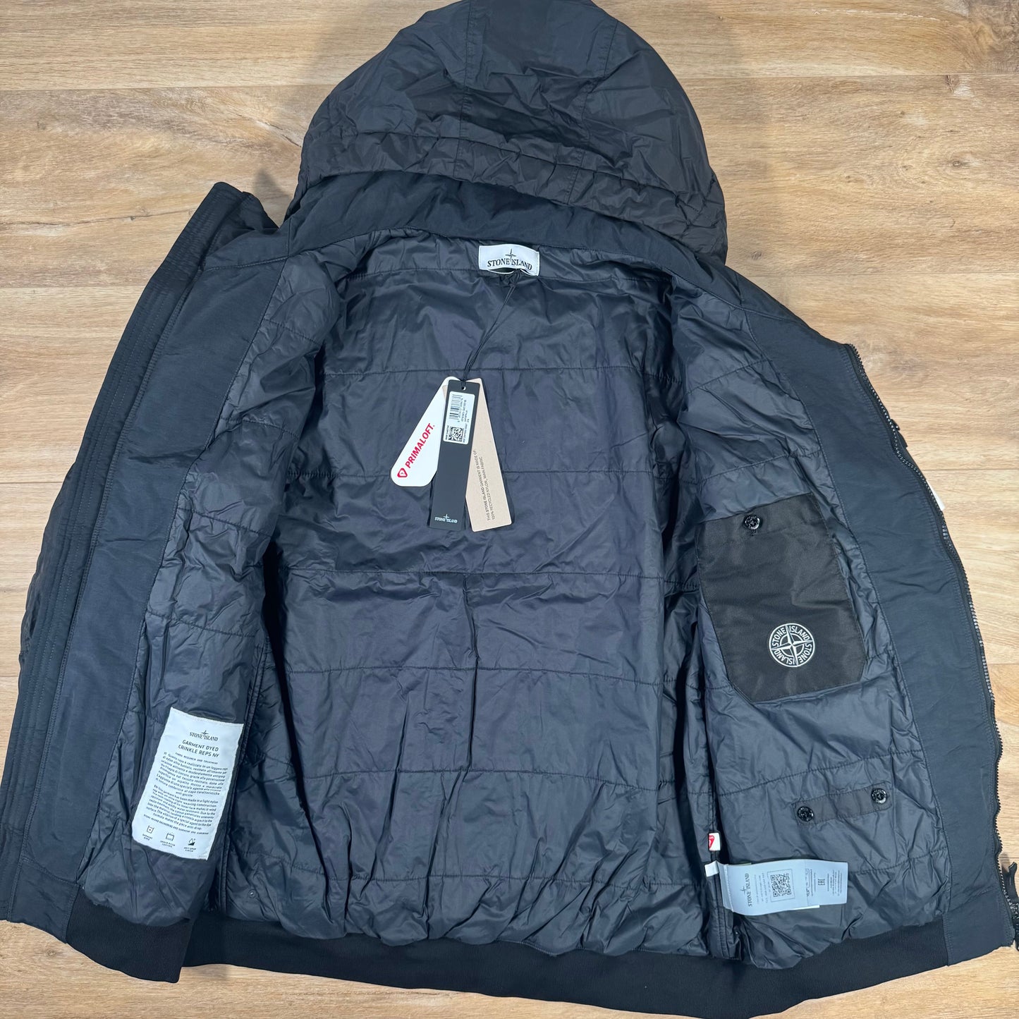 Stone Island Crinkle Reps NY Padded Jacket in Black