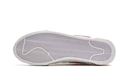 Blazer Low "Sacai - Kaws Red" DM7901 600